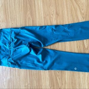 Lululemon Wunder Train high rise leggings with pockets in Teal.